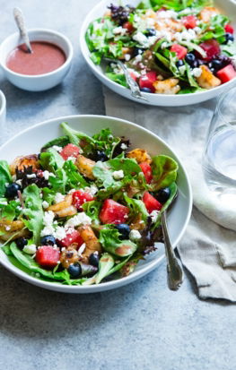vegetable salad on white ceramic bowl